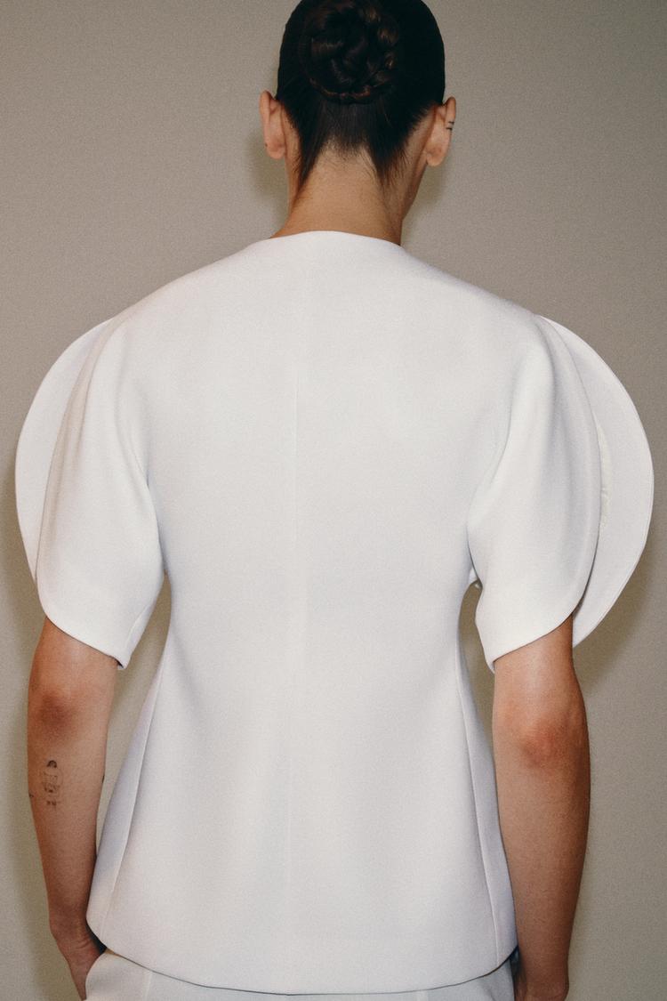 Top with a v-neck